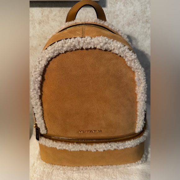 Michael Kors Handbags - Michael Kors Tan and Cream medium Suede and Faux Shearling Backpack